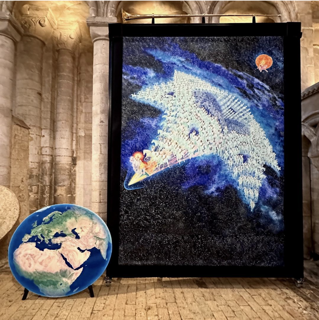 The Return of Jesus Christ artwork displayed in exhibition with Earth globe